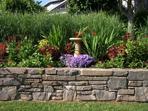 a border with birdbath